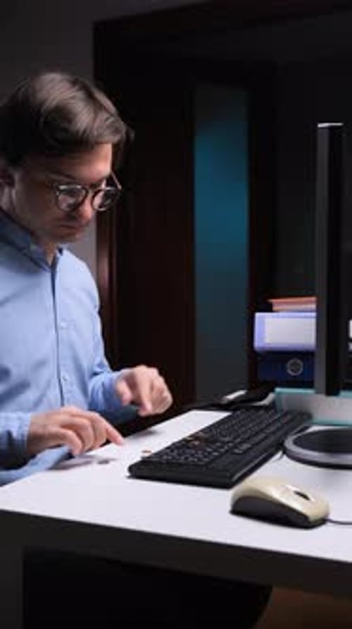 Vertical Video Office Worker Checking Empty Wallet at Night Showing Financial Problems