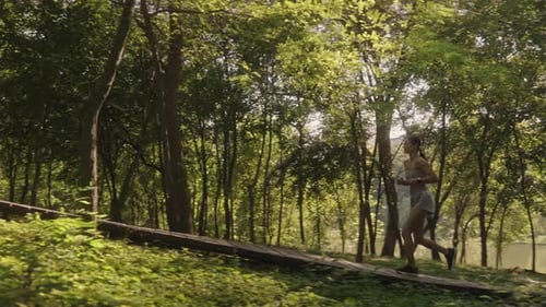 Woman Running Fitness Forest Trail