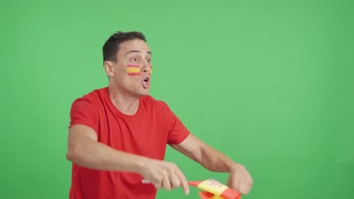 Enthusiastic Sports Fan Waving Flag on Green Screen