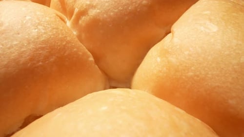 Close Up View of Golden Brown Dinner Rolls