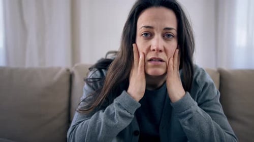 Front View of Depressed Woman Indoors, Mental Health Concept