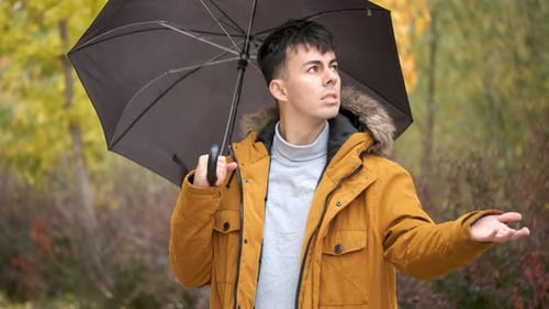 Young Adult Outside on a Rainy Autumn Day