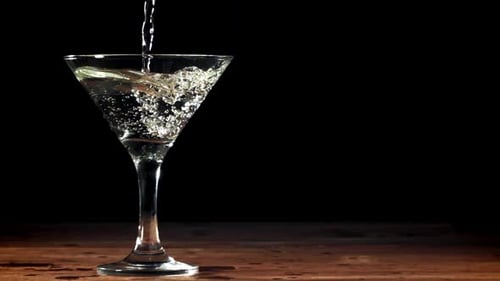 Martini Glass Filling with Clear Liquid