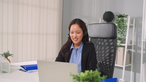 Asian beautiful businesswoman call center working in office workplace.