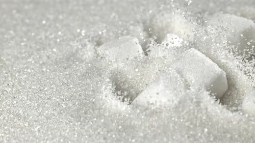 Sugar Cubes Fall Into a Pile of Sugar Filmed on a Highspeed Camera at 1000 Fps