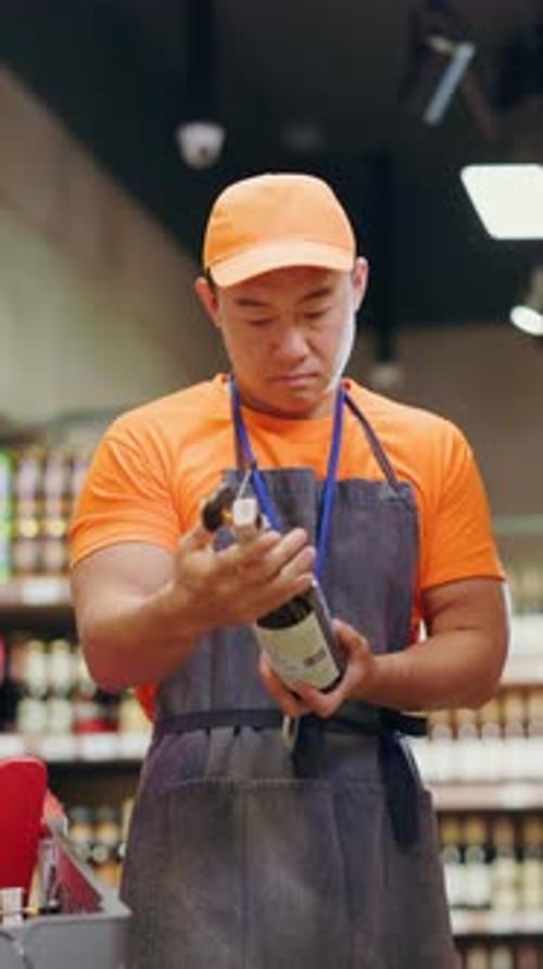 A Dedicated and Professional Media Stocker Carefully Organizing Various Products in Store