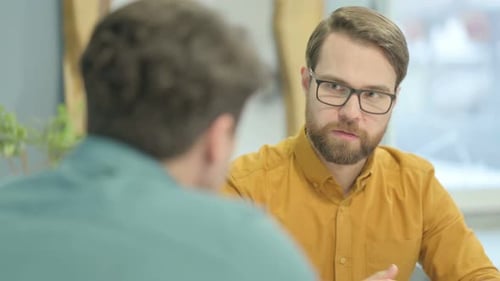 Close Up of Business People Talking in Office