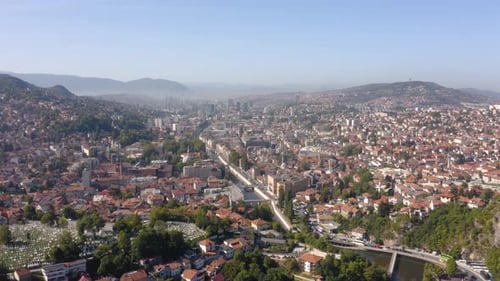 Scenic Aerial View of a Cityscape and Mountains