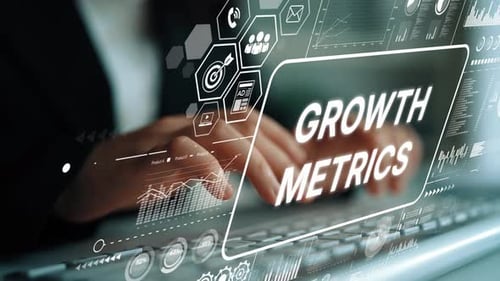 Business Person Analyzing Data on Growth Metrics with Digital Interface and Graphs in Modern Office