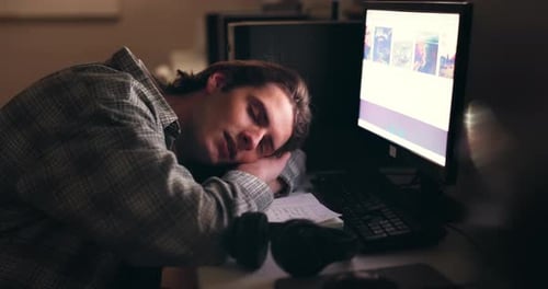 Sleeping, student and tired man at desk, stress and relax at night on computer