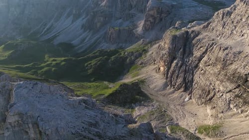 The Dolomites present a breathtaking juxtaposition of rugged cliffs and serene valleys, bathed in so