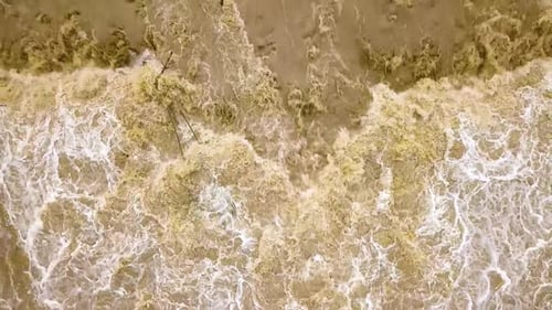 Dirty River with Muddy Water in Flooding Period During Heavy Rains in Spring