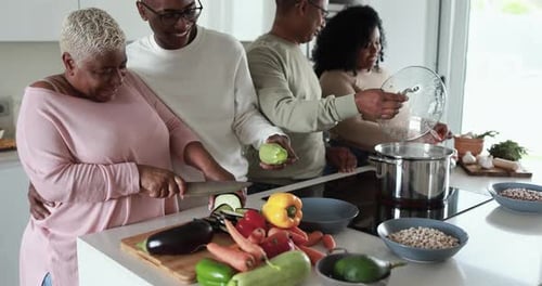 Family Cooking Together in a Bright Modern Kitchen