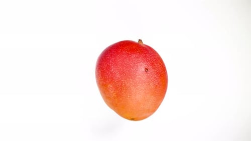 Overhead View of Sweet Ripe Red Mango Spinning