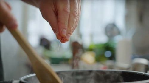 Adding Ingredients to Pan for Cooking at Home