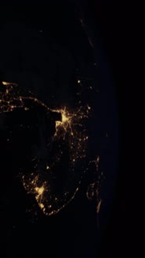 Earth at Night with City Lights Elements Furnished By NASA Vertical