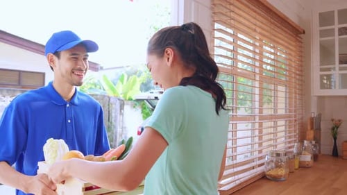 Woman Receives Fresh Grocery Delivery at Home