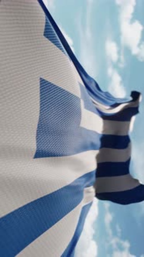 Waving Flag of Greece on a Clear Day
