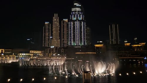 Burj Khalifa fountain in Dubai. Dubai fountain at night close up.