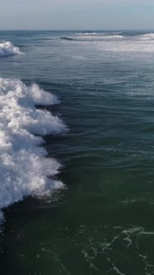 Vertical Video of Foamy Sea Waves