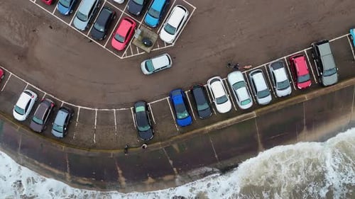 Stormy winter scene. Rough seas of the English coast with mist and fog. Aerial footage of the sleepy