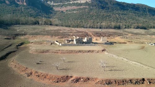 Views of a village that is normally submerged; now, due to the drought, the ruins can be visited Sau