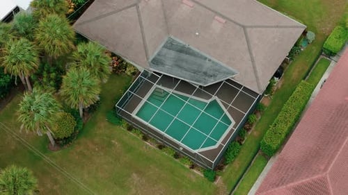 Aerial Above View of Screened in Pool and Lanai in Florida House