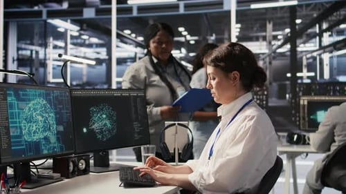 Data Center Software Developer Using PC to Monitor Neural Networks