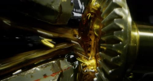 Slow motion macro of specialist is working on production of different gearing details in a worksho