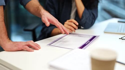 Business People Analyzing Data in a Modern Office Meeting
