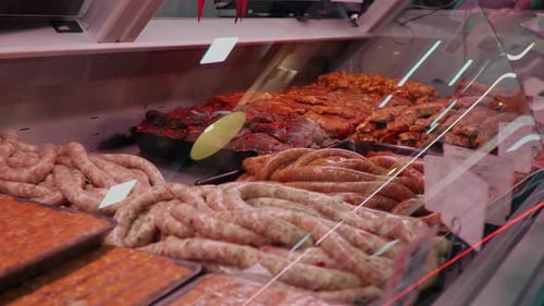 Window shop layout of diverse meat production in butchers shop.