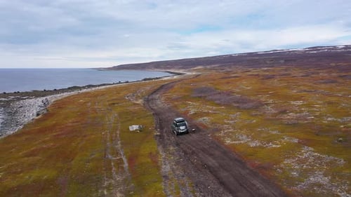 Off road tourist car rides off-road in the highlands. Expedition travel and vacation, adventures in