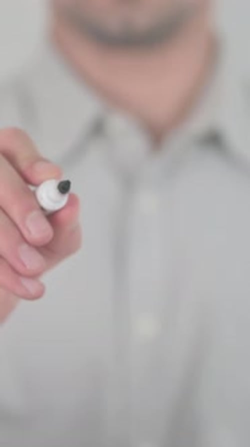 Adult Writes the Word Study With Marker