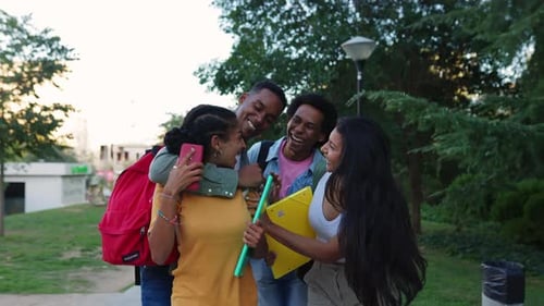 Young Student Girl Meeting Classmate Friends While Going to University Classes