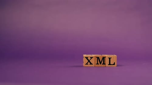 Purple Warm Background with Shadows Wooden Cubes with Black Letters and Laid Out Words From Letters