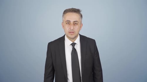 Businessman Speaking, Giving Opinion in Suit and Tie