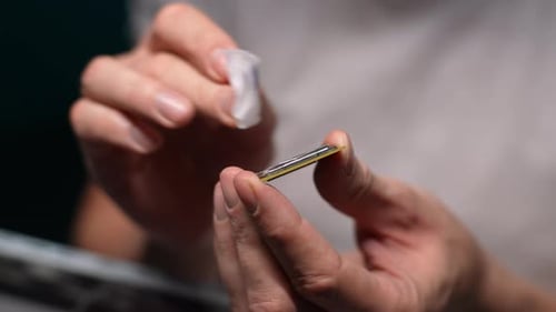 Cropped Shot of Unrecognizable Computer Master Removing with Rag Covering Old Thermal Paste From