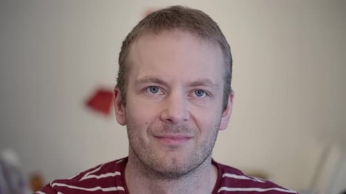 Portrait of man in emotional distress, breaks down