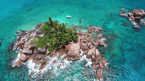 The small island of St. Pierre in the Seychelles, filmed from above.