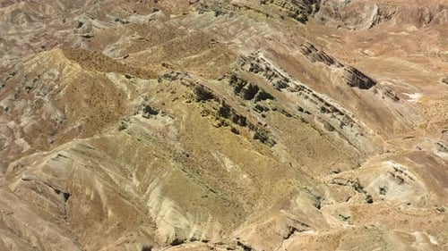 Flying over the ancient layered mountain formations in the Rainbow Basin part of the Mojave Desert;