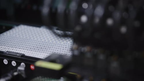 Automated Machine Placing Components on Circuit Board