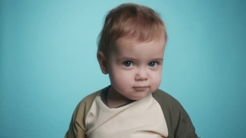 Closeup Portrait Little Caucasian Boy Kid with Serious Thinking Curious Look