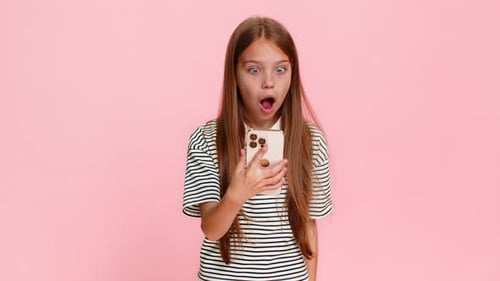 Shocked Girl Reacts to Something on Her Phone