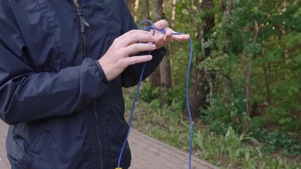 Unraveling Jump Rope Outdoors Close Up Before Training, Sports Stock ...