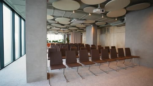 Empty Meeting Room with Chairs and Projector