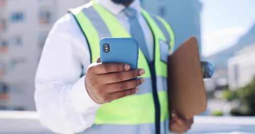Engineer, construction and hands typing on phone outdoor for communication and 5g connection