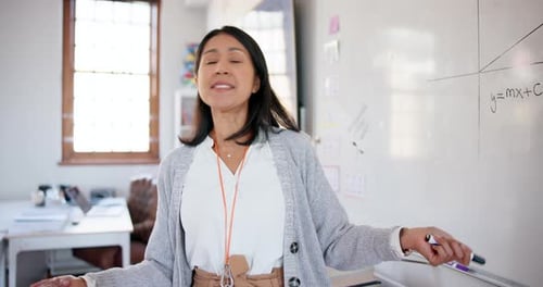 Education, whiteboard and teacher doing presentation in classroom for maths lesson at school