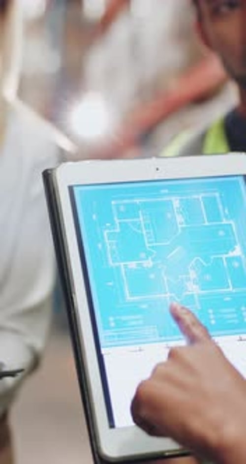 Person, meeting and blueprint on tablet screen for warehouse design, floor plan and expansion