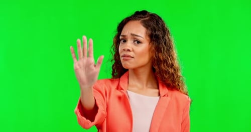 Face, hand and woman with warning, green screen and girl with stop on a studio background