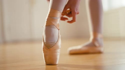 Ballerina Puts Pointe in Ballet Studio Professional Classic Ballet Dancer Preparing to Training